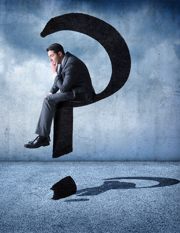 Businessman-Sitting-On-A-Floating-Question-Mark